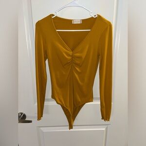 Mustard colored yellow bodysuit! NEVER WORN